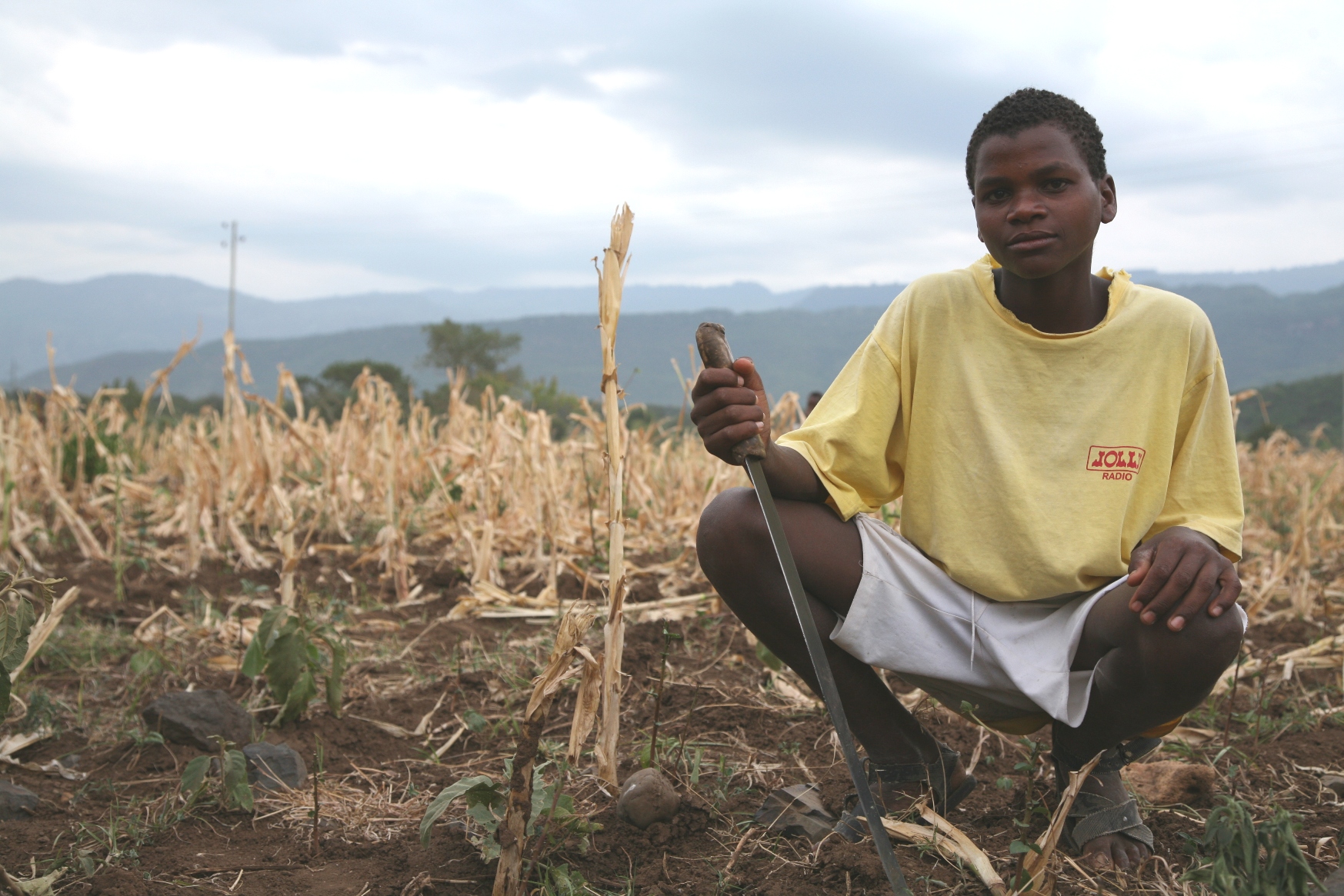 A young man in drought conditions in Ethiopia